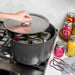 Verde 16 qt stock pot on the stovetop filled with canning jars