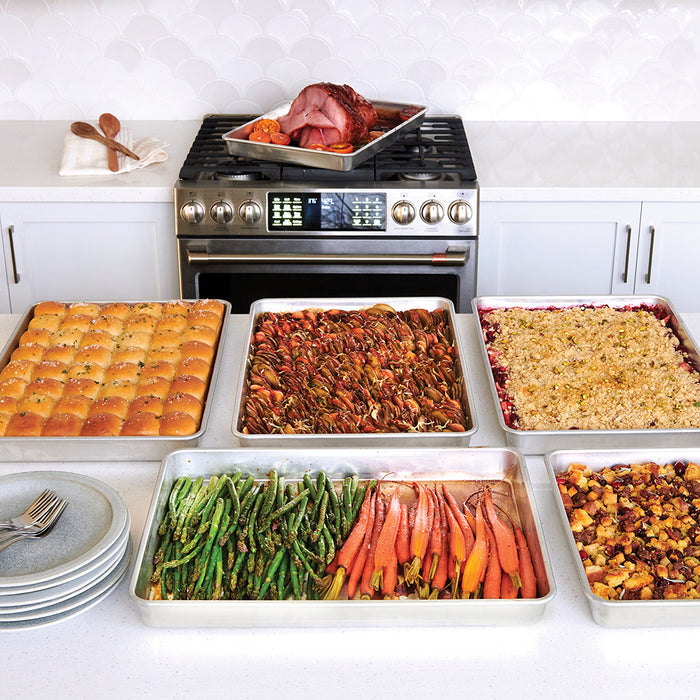Two Big Batch Pans with lasagna and roasted vegetables