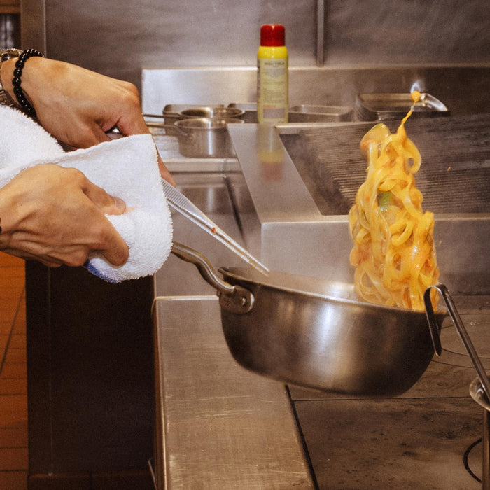 Made In Stainless Clad Saucier 2QT in use