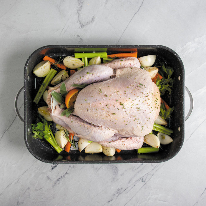 Turkey and vegetables prepped in the Verde Grand Roaster before roasting