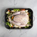 Turkey and vegetables prepped in the Verde Grand Roaster before roasting