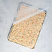 Big sheet pan filled with rice crispy treats, overhead view