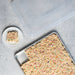 Rice crispy treats in the sheet pan with one square plated
