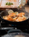 Made In Enameled Cast Iron Skillet in use
