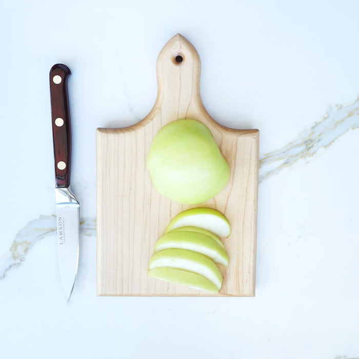 J.K. Adams Mini Maple Cutting Board slicing an apple