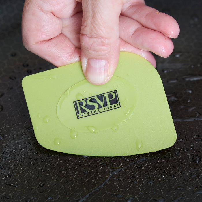 RSVP pan scraper cleaning a pan