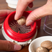 Grating whole nutmeg in the FinaMill Grater Pod