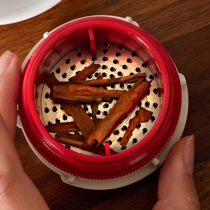 Cinnamon sticks loaded in the FinaMill Grater Pod